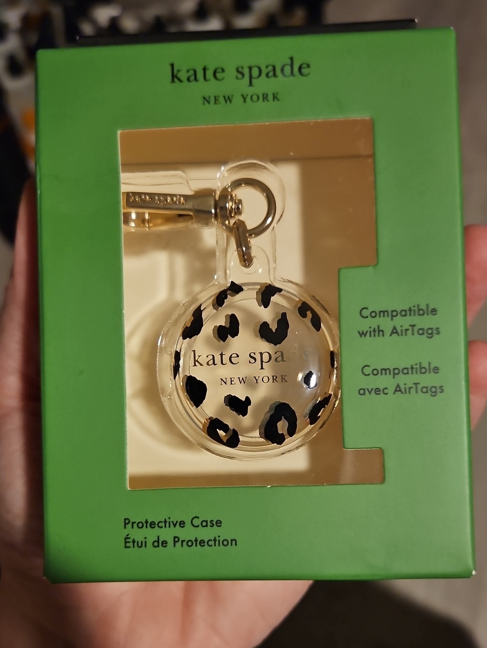kate spade Clear Leopard AirTag Case with Gold Hardware
